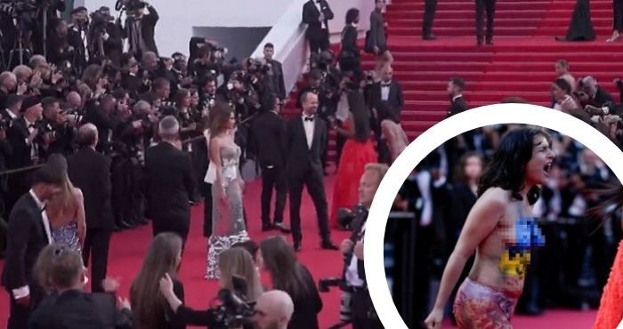 Festival di Cannes, una donna nuda fa irruzione sul red carpet in segno di protesta (VIDEO) Festival di Cannes, una donna nuda fa irruzione sul red carpet in segno di protesta (VIDEO)