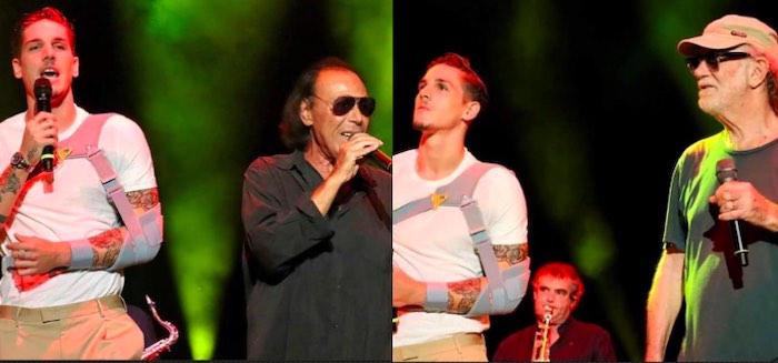 Nicolò Zaniolo canta sul palco al concerto di Venditti e De Gregori