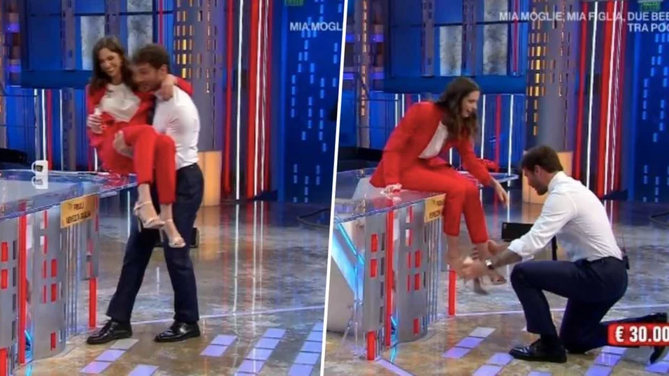 De Martino ad Affari Tuoi prende in braccio la concorrente: la scena