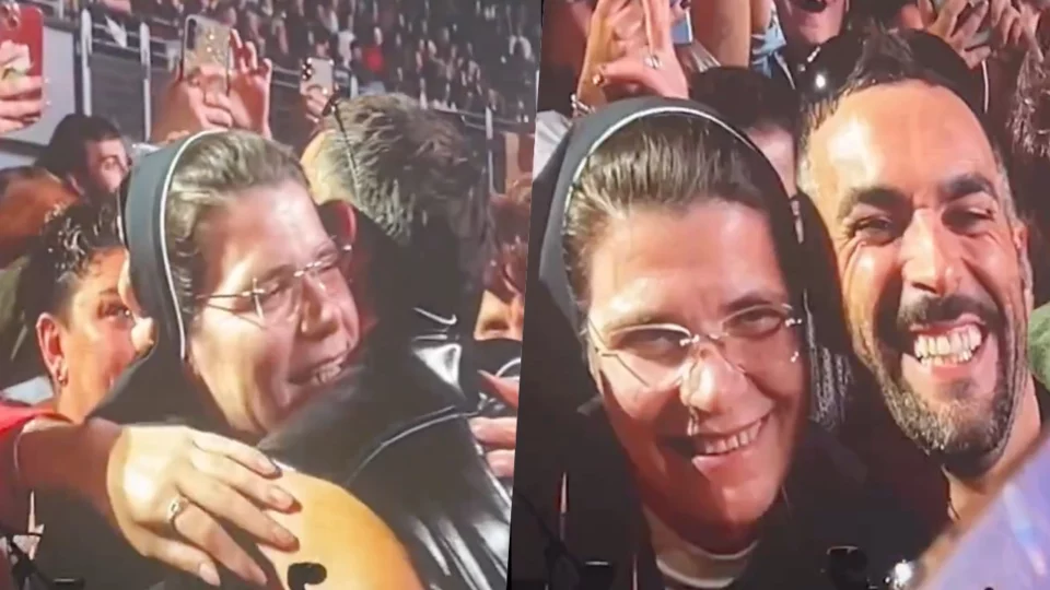 Marco Mengoni scende dal palco per abbracciare una suora