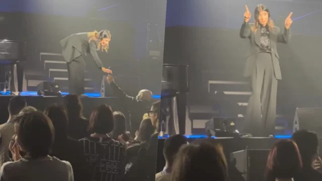 Giorgia passa il microfono ad una fan e la fa cantare durante un concerto